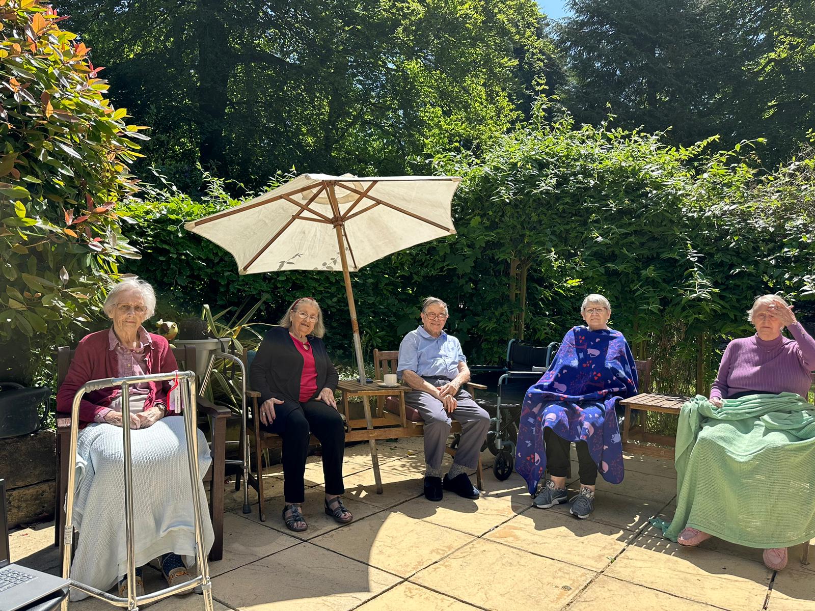 People sat in the garden