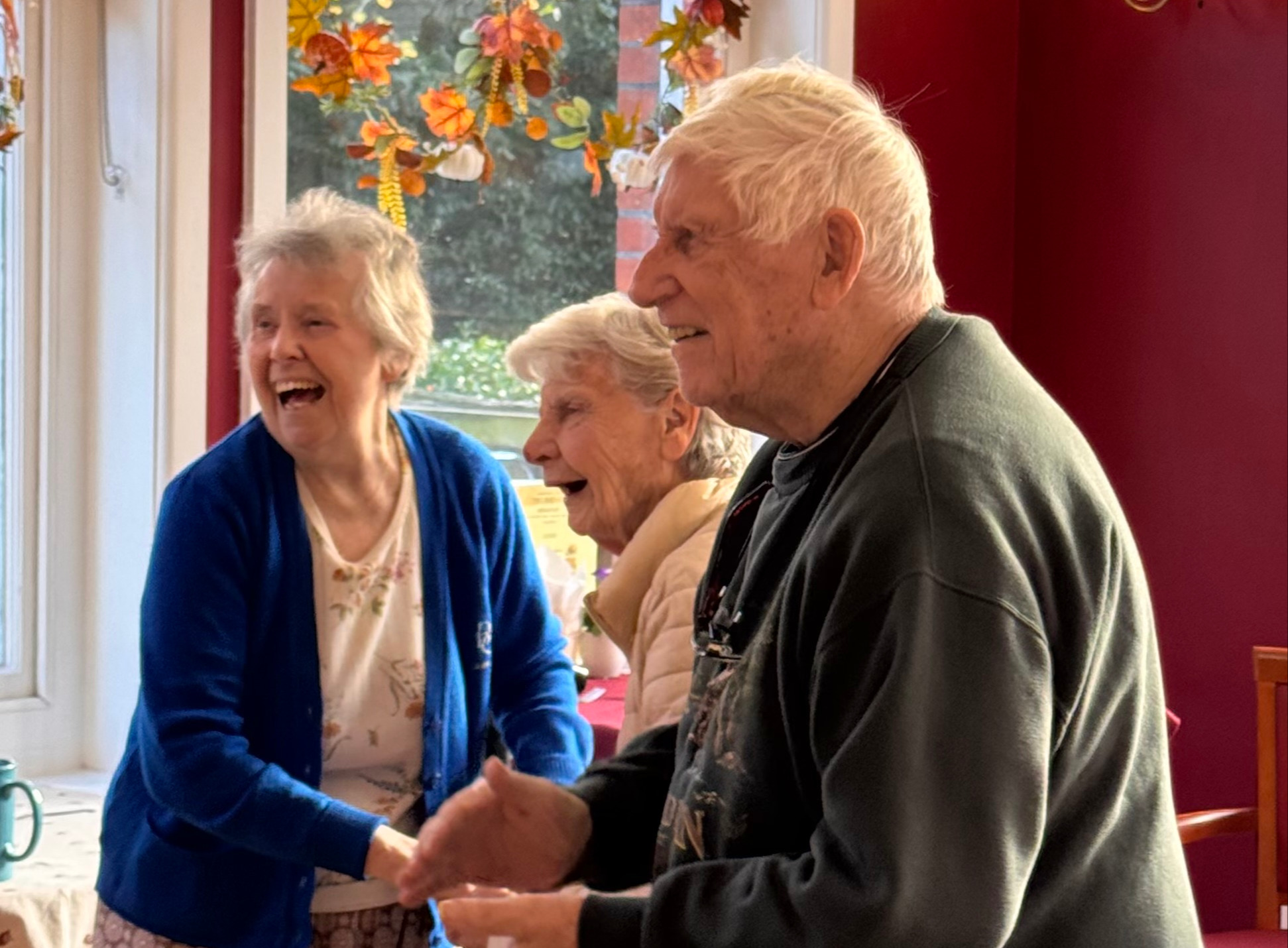 Residents smiling and laughing