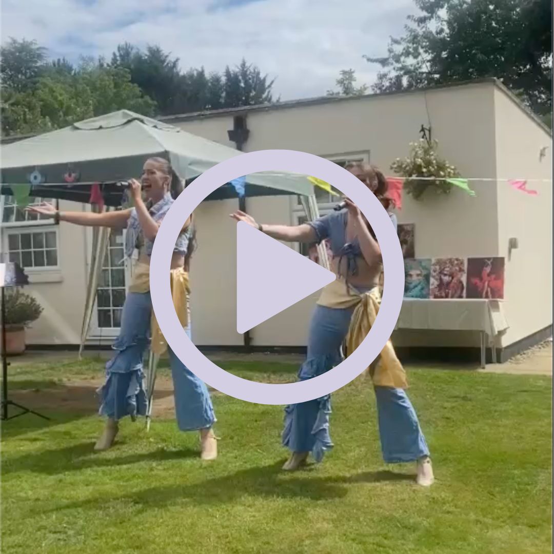 Musical entertainers performing in the garden