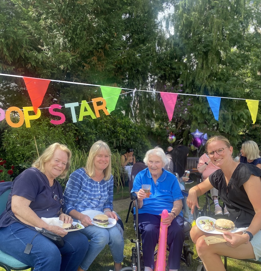 A group of people at a garden party