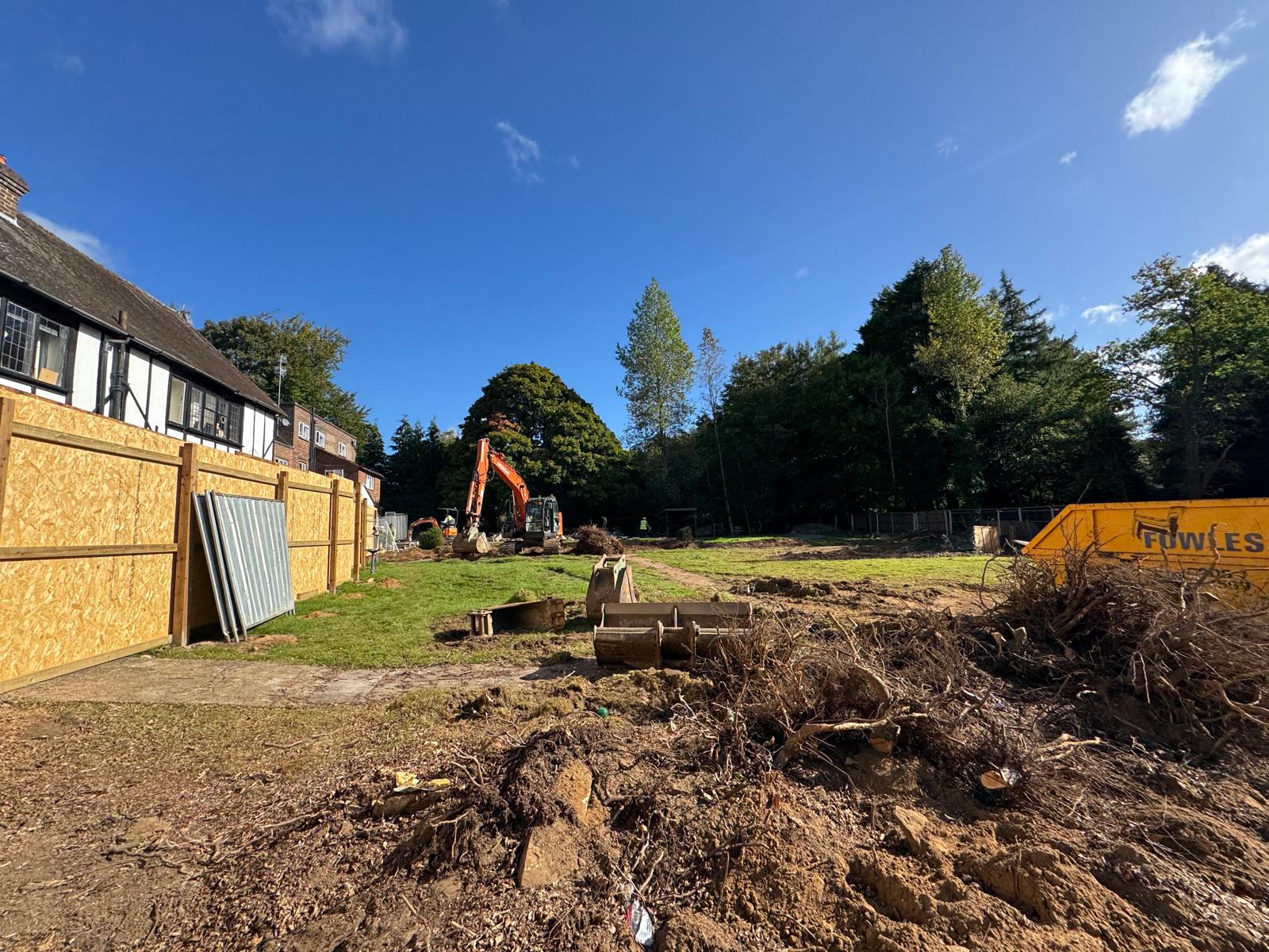 Ground being cleared and trees removed for construction