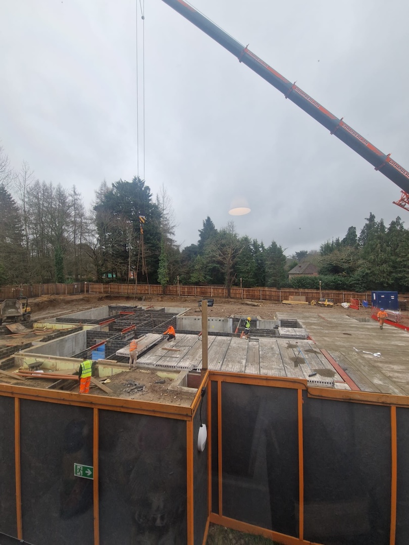 A construction site with workers and machinery