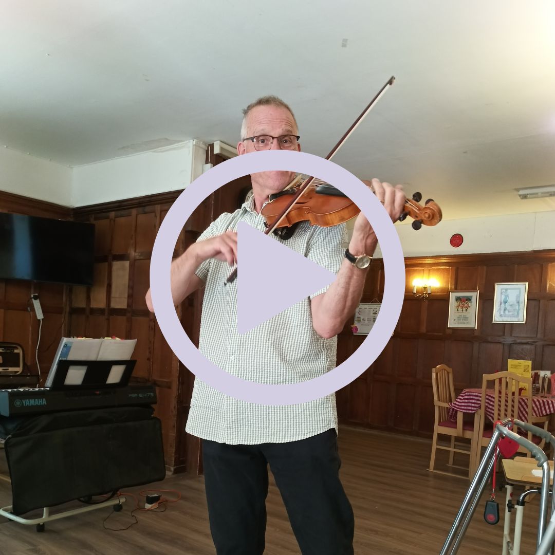 A man playing a violin