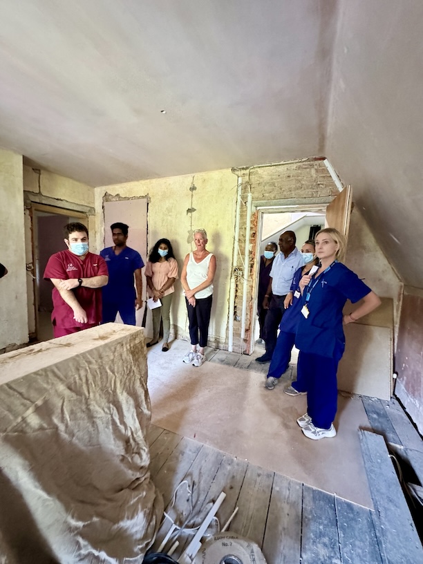 The staff view progress on renovations at Windsor Court