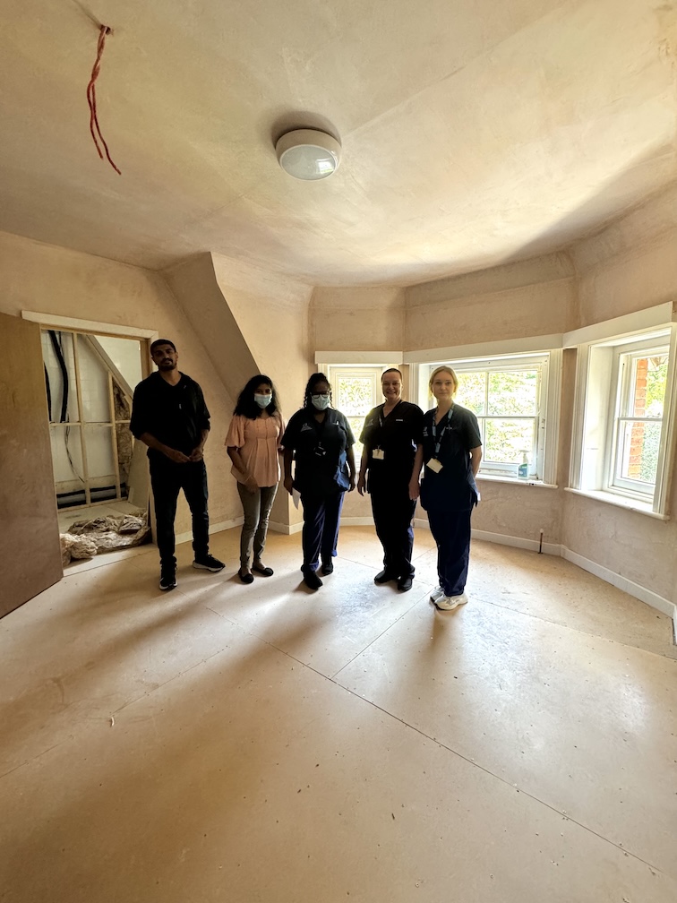 The staff view progress on renovations at Windsor Court