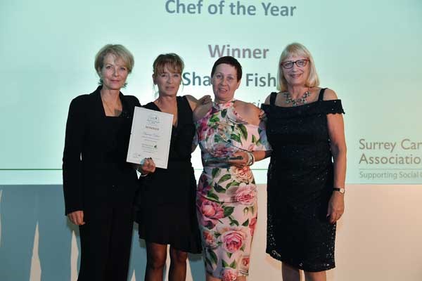 Robertson team accepting an award at the Surrey Care Awards