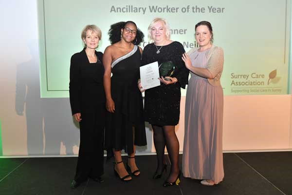 Ashton Manor team accepting an award at the Surrey Care Awards