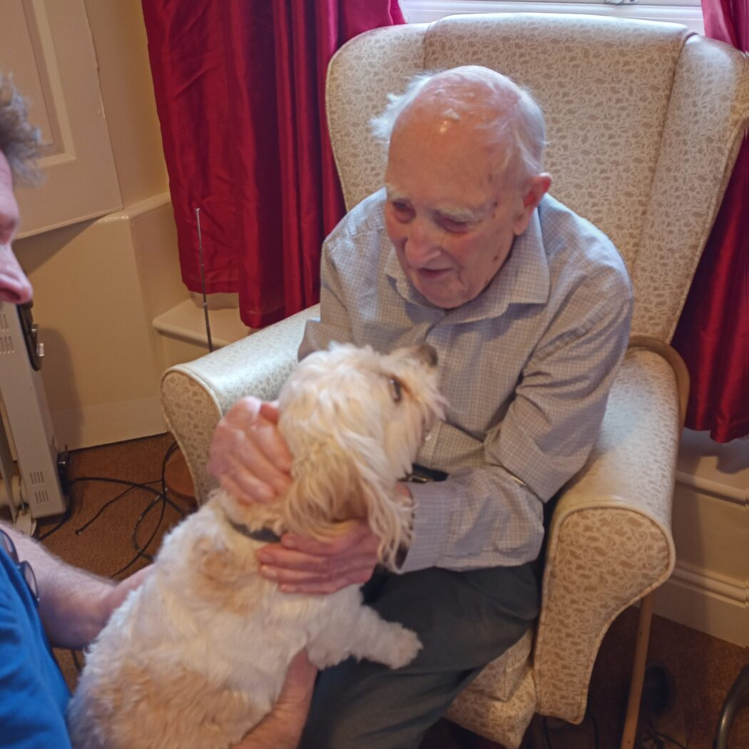 Elderly gentleman with a dog