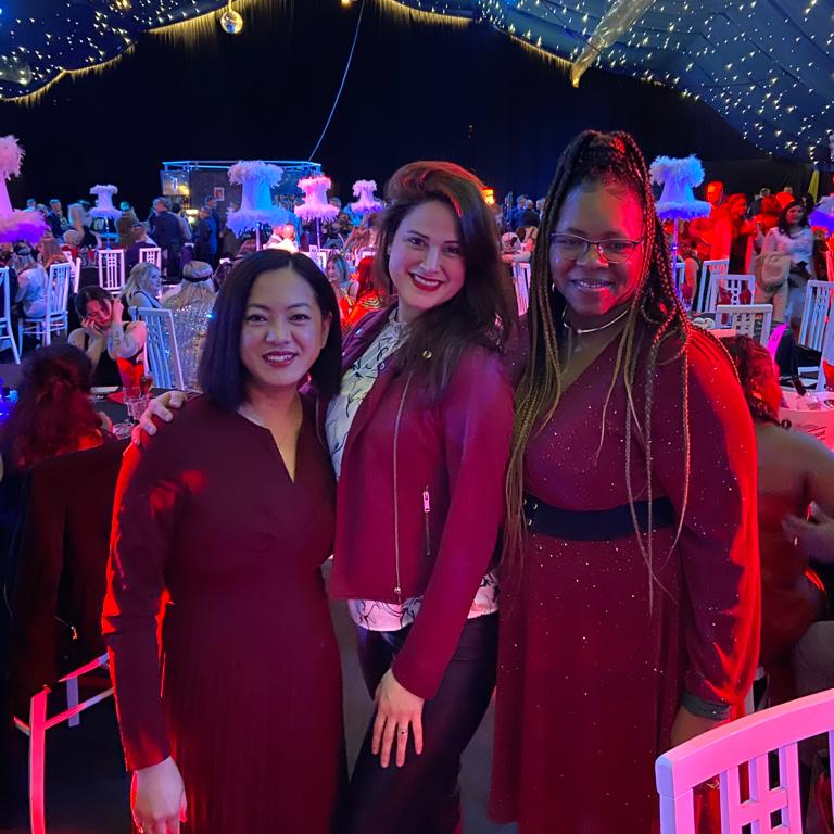 A group of female staff members at the staff Christmas party