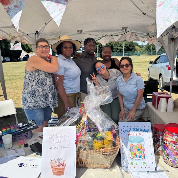 Team members running a stall at the local village fete