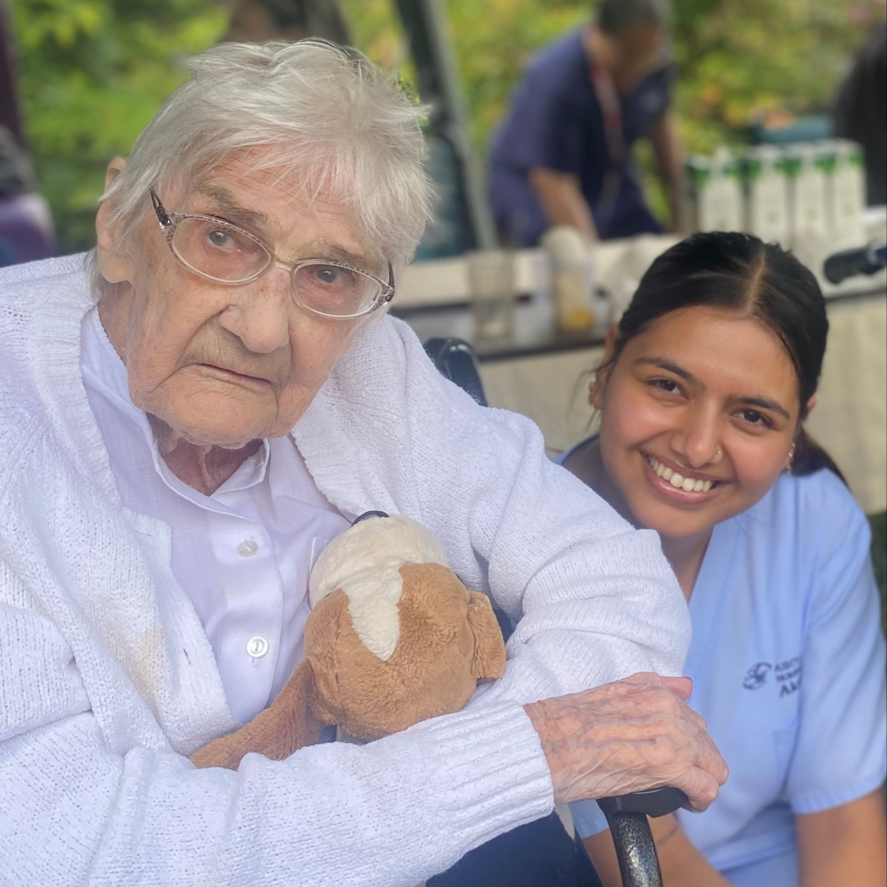 Resident and staff member