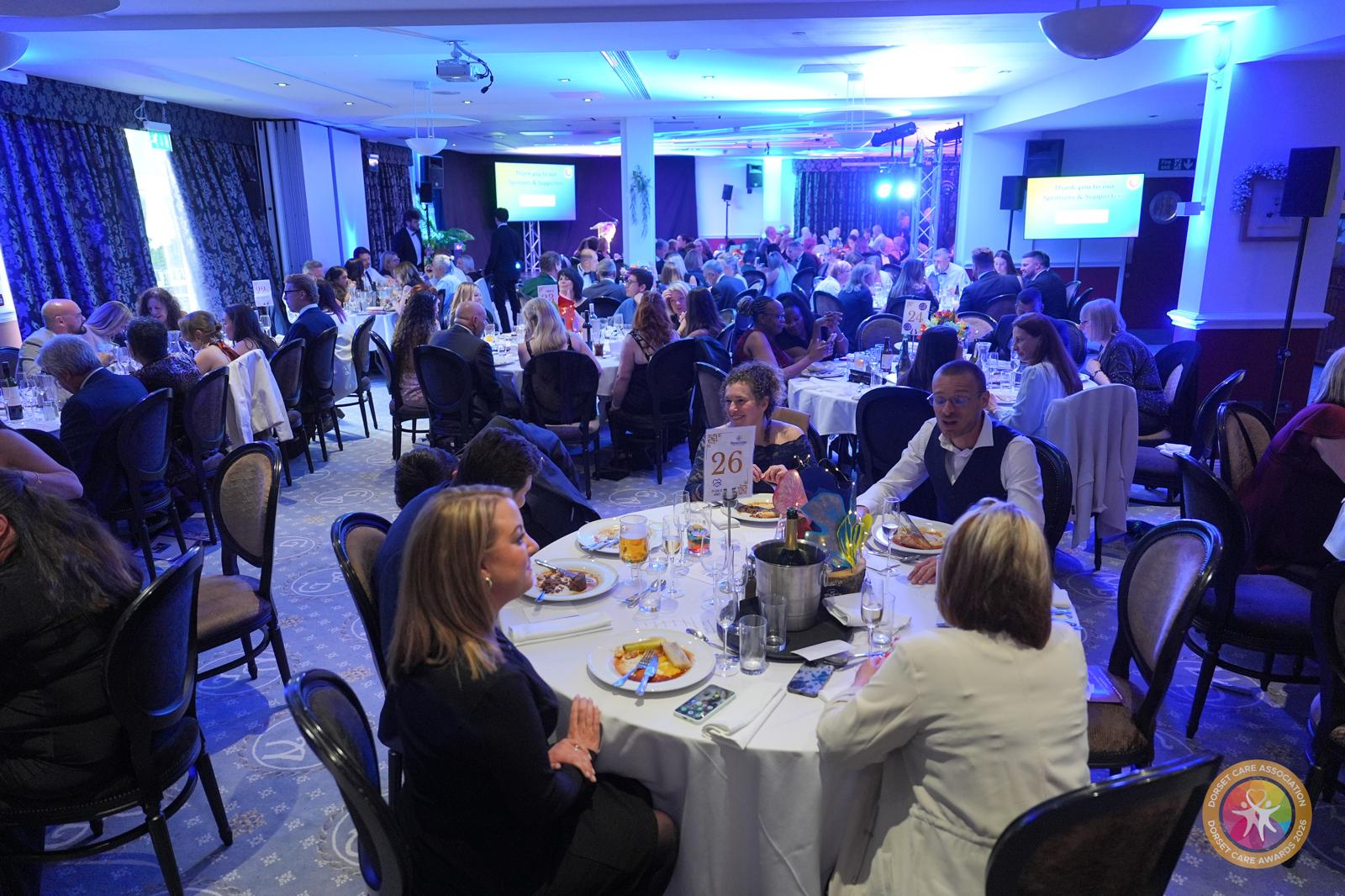 A room full of people at an awards event