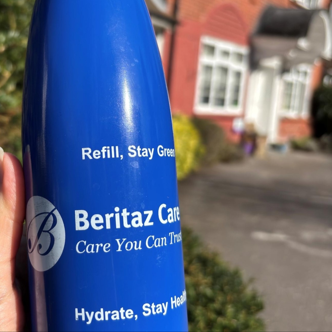 A blue reusable water bottle