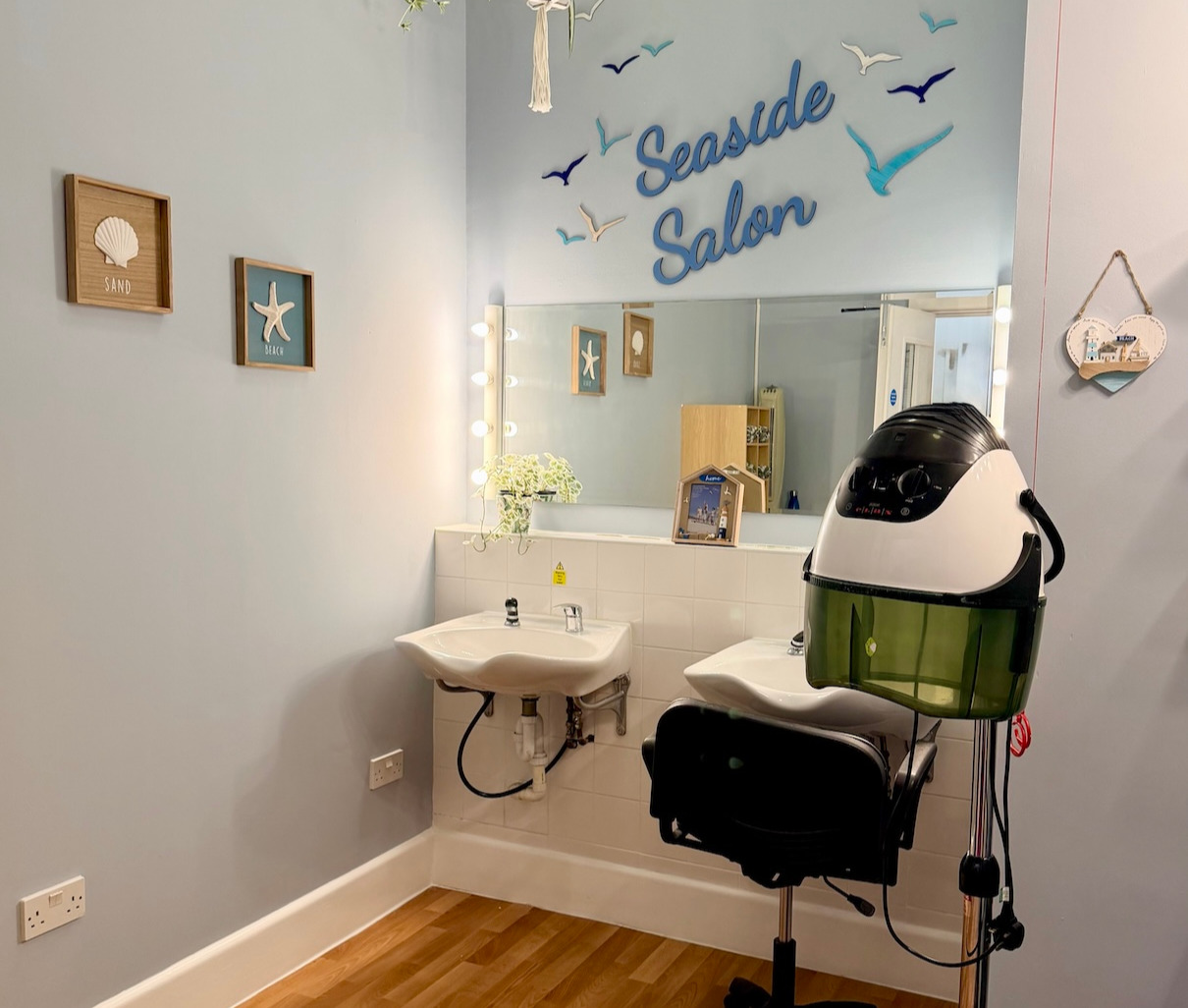 A bright a light salon with hairdressing equipment